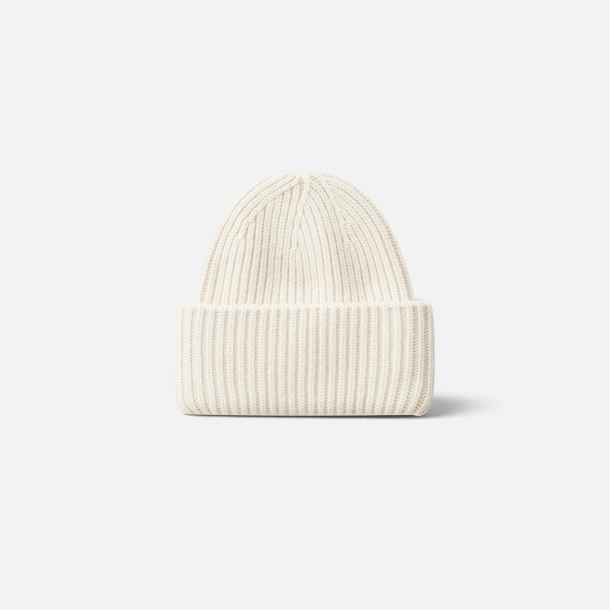 Shop Rescue Spa unisex cream ribbed knit beanie made from 100% cashmere with a folded cuff design.