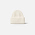 Shop Rescue Spa unisex cream ribbed knit beanie made from 100% cashmere with a folded cuff design.