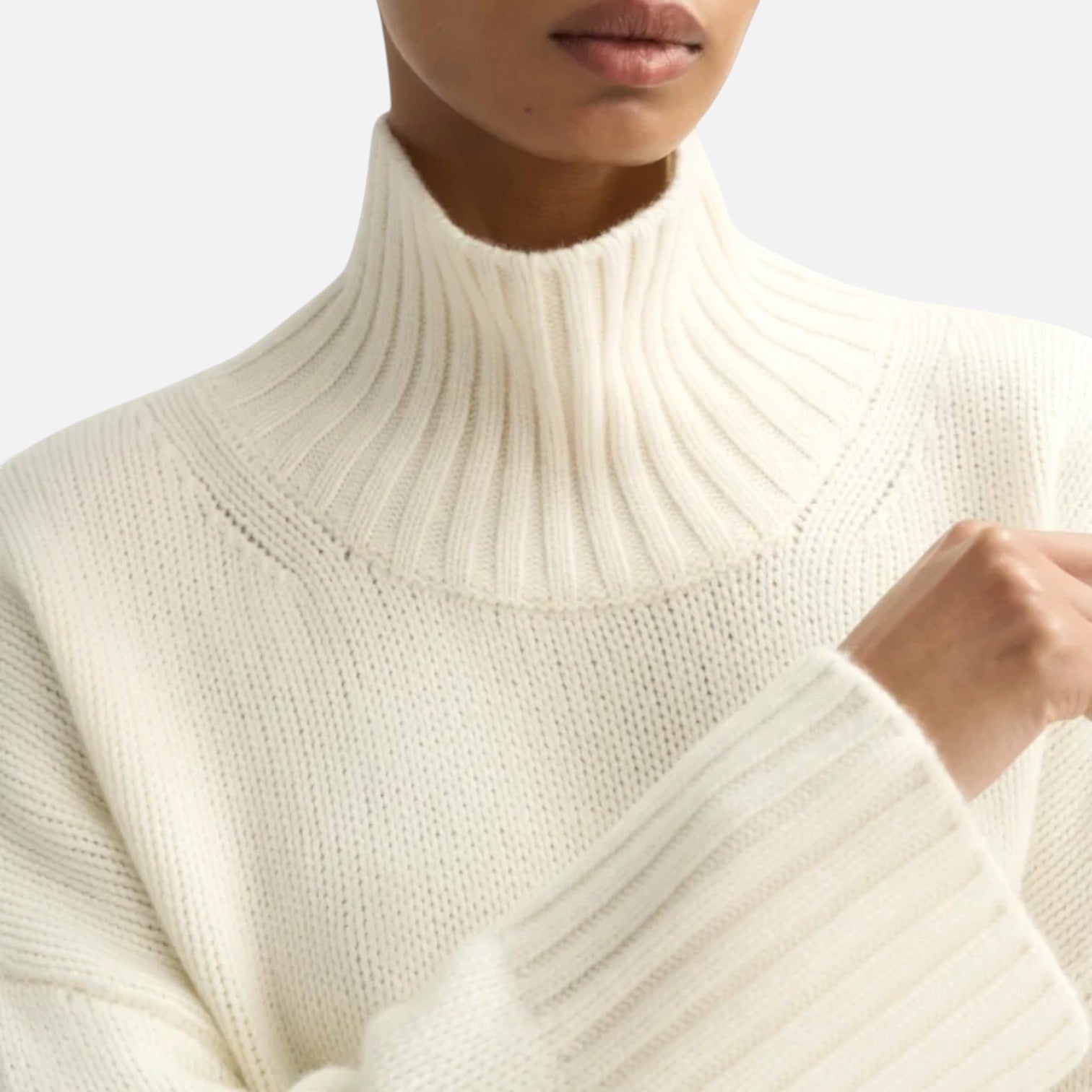 Shop Rescue Spa cream chunky knit cashmere turtleneck sweater with ribbed collar and sleeve slits