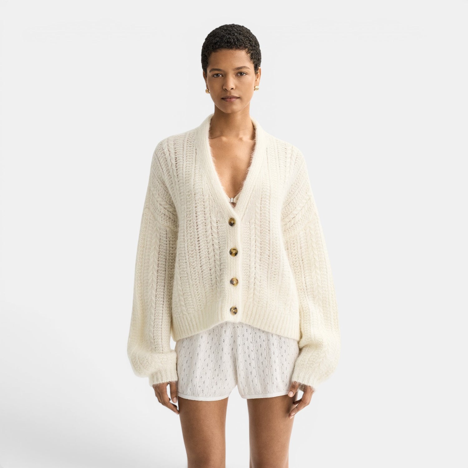 Shop Rescue Spa cream jacquard knit V-neck mohair silk cashmere blend cardigan with button front.
