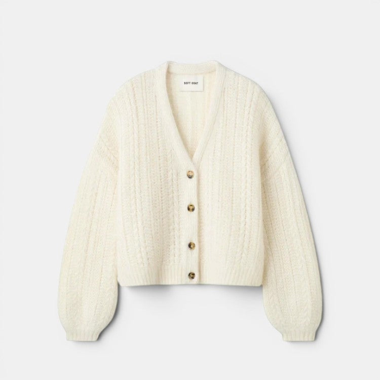 Shop Rescue Spa cream jacquard knit V-neck silk blend cardigan with relaxed fit and button front.