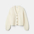 Shop Rescue Spa cream jacquard knit V-neck silk blend cardigan with relaxed fit and button front.