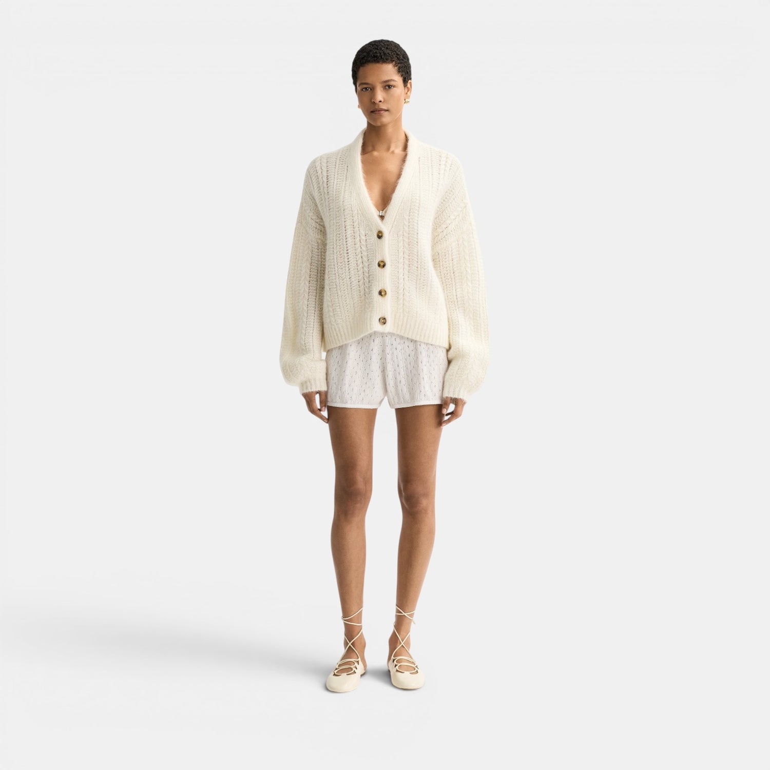 Shop Rescue Spa Scream jacquard knit V-neck silk blend cardigan with button front and relaxed fit.oft Goat