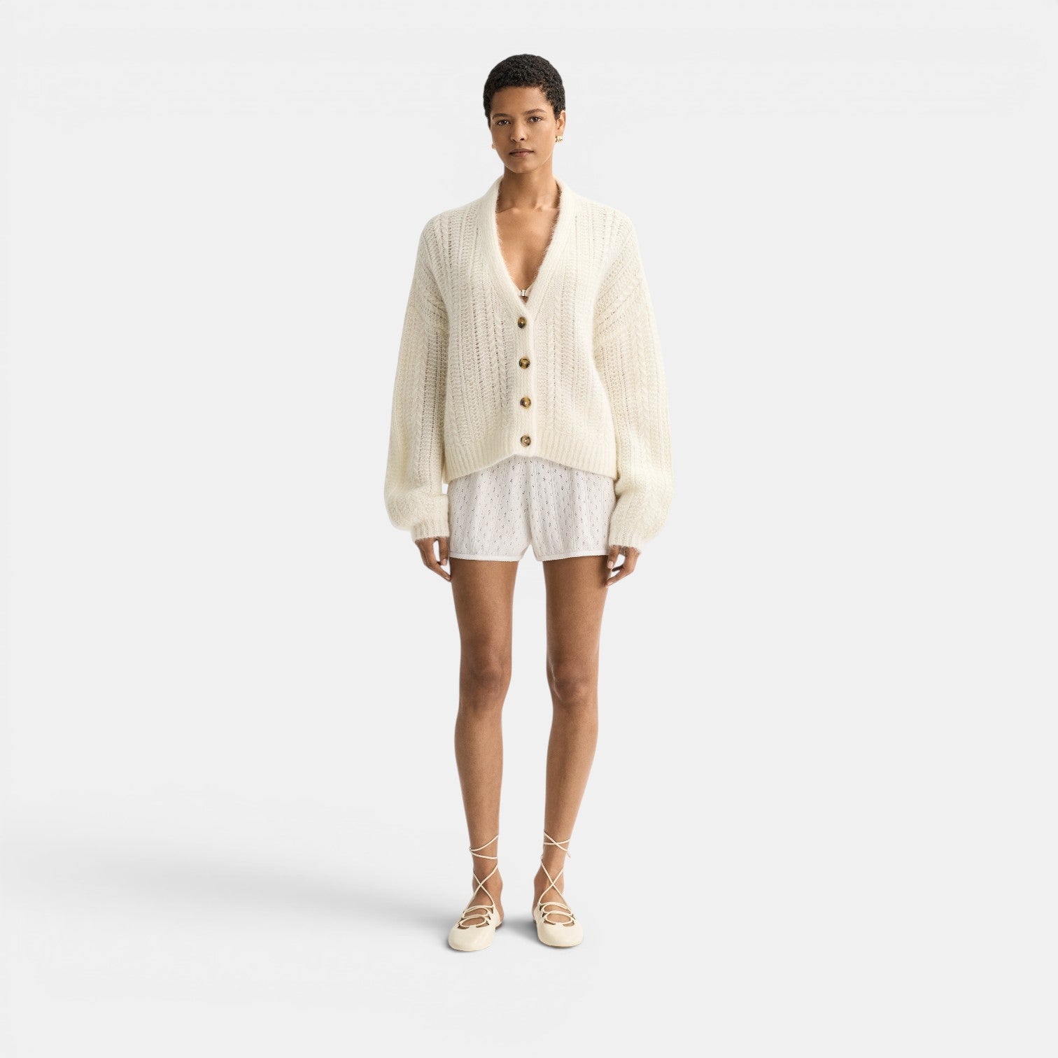Shop Rescue Spa Scream jacquard knit V-neck silk blend cardigan with button front and relaxed fit.oft Goat
