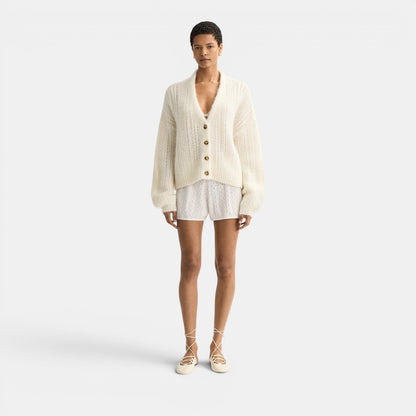 Shop Rescue Spa Scream jacquard knit V-neck silk blend cardigan with button front and relaxed fit.oft Goat