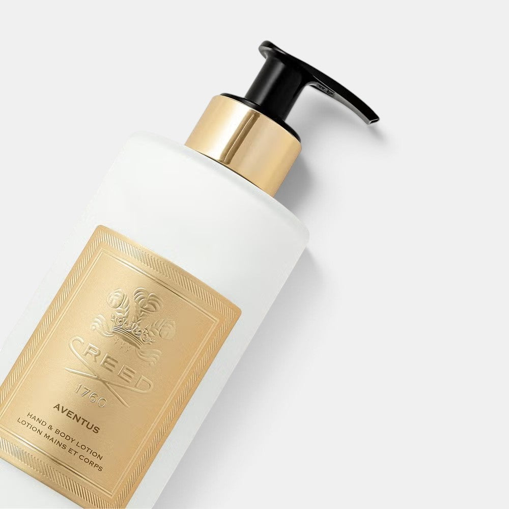 Shop Rescue Spa The House of Creed Aventus Hand &amp; Body Lotion in a frosted bottle with a gold label and pump dispenser.