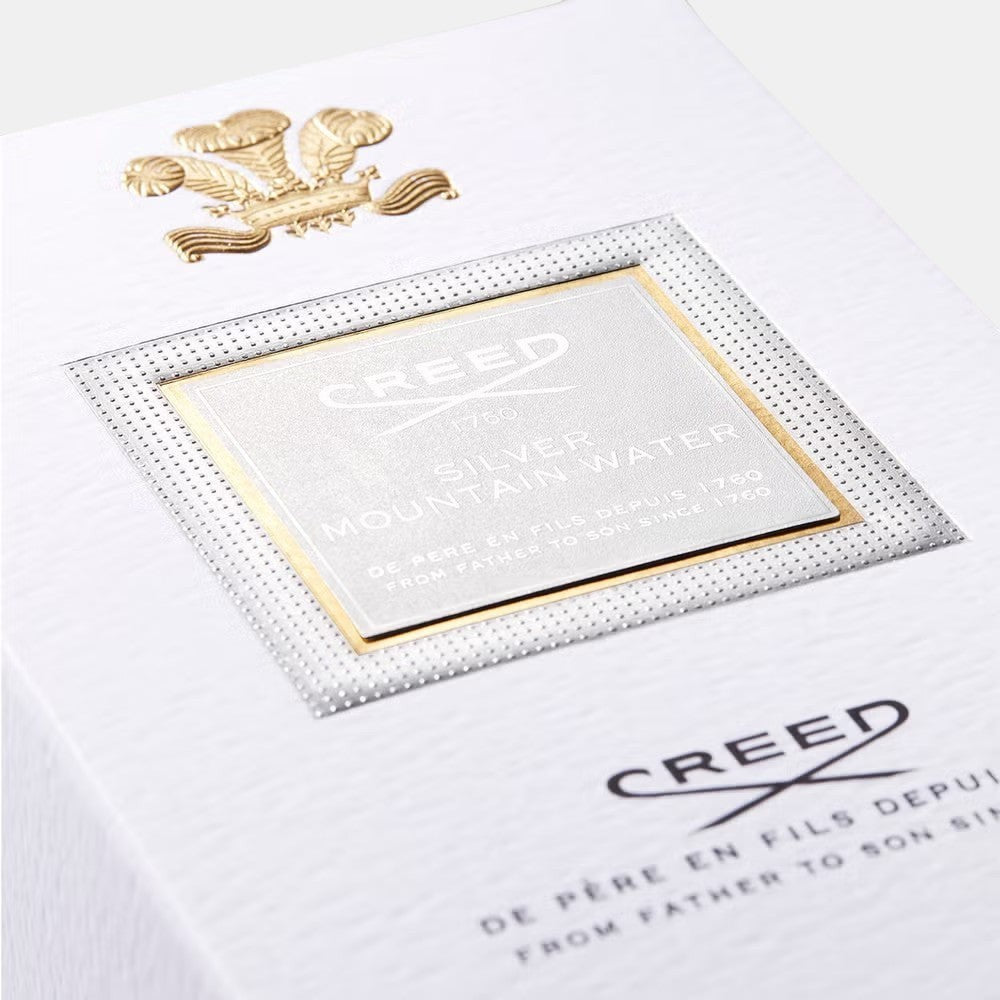 Shop Rescue Spa Creed Silver Mountain Water perfume box with white textured finish and gold embossed logo detail