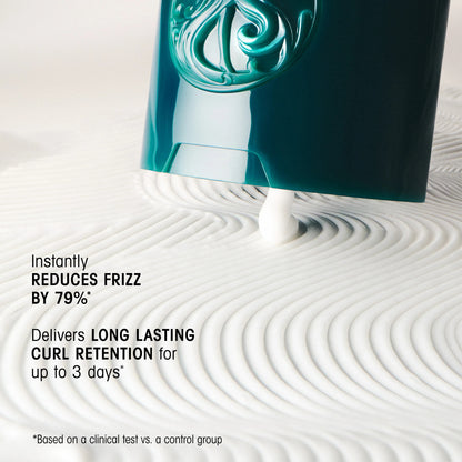 Shop Rescue Spa Styling Butter Curl Enhancing Cream in teal bottle, reduces frizz and defines curls.