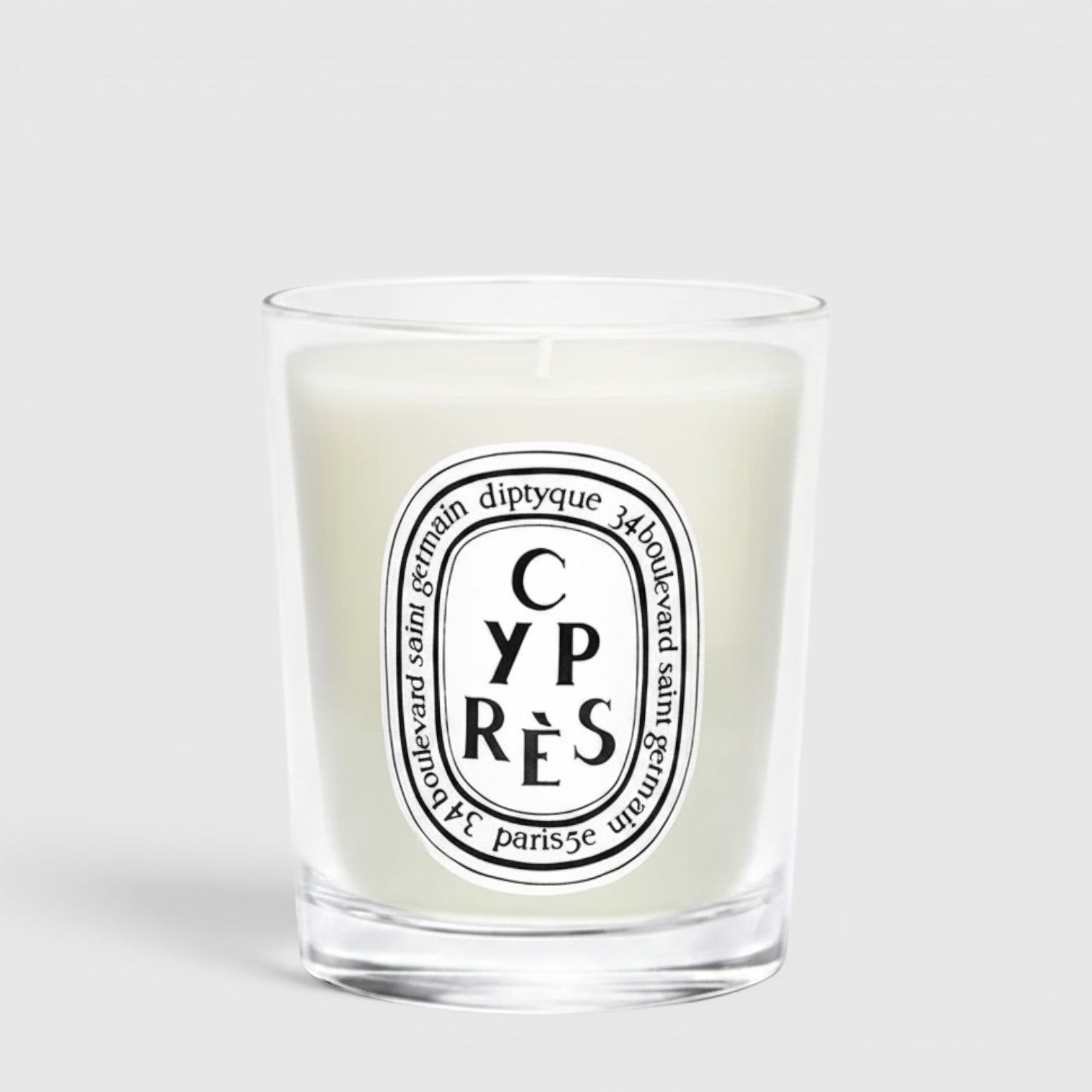 Shop Rescue Spa Cypres candle in a clear glass jar with a white wax finish and signature oval label