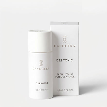 Shop Rescue Spa Danucera D22 Tonic exfoliating facial toner bottle and its white packaging box on a neutral background.
