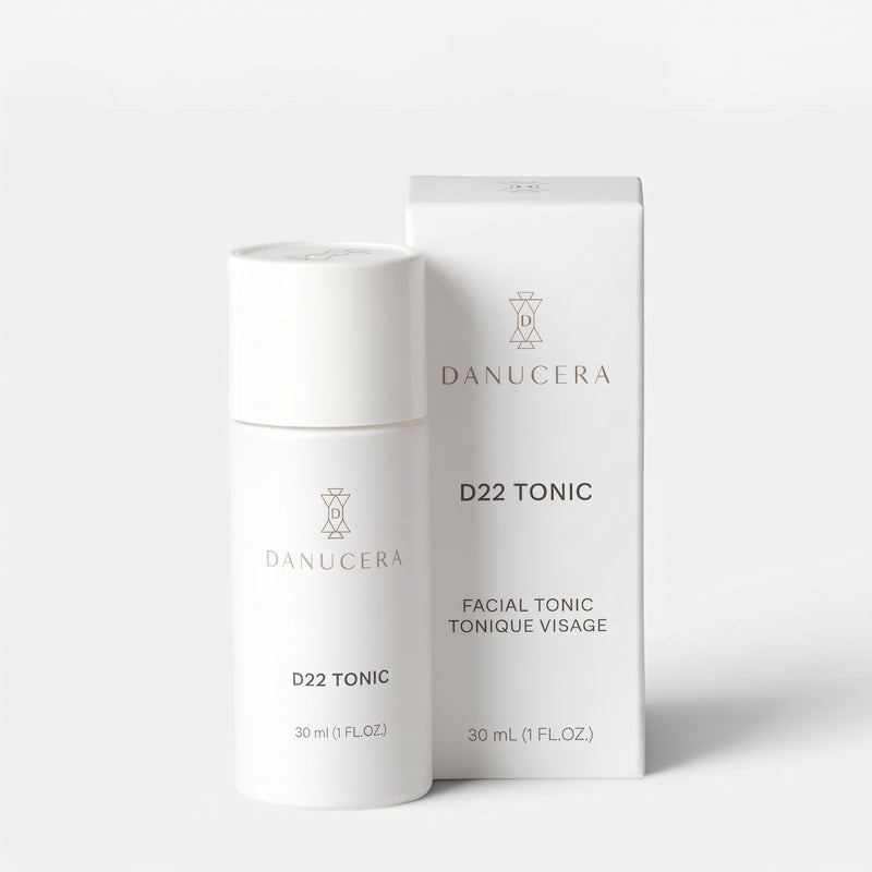 Shop Rescue Spa Danucera D22 Tonic exfoliating facial toner bottle and its white packaging box on a neutral background.