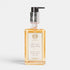 Shop Rescue Spa Antica Farmacista Damascena Rose, Orris & Oud hand and body wash in a clear pump bottle.