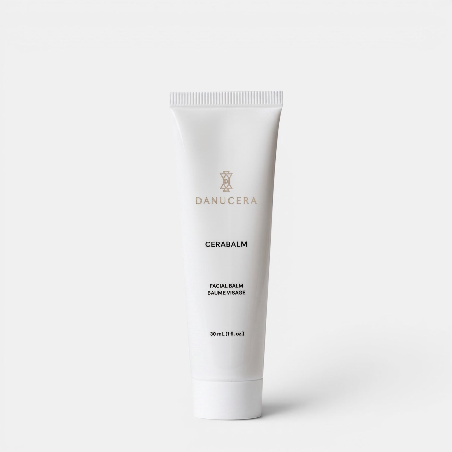Shop Rescue Spa Danucera Cerabalm multi-purpose facial cleansing balm in a white 30ml squeeze tube.