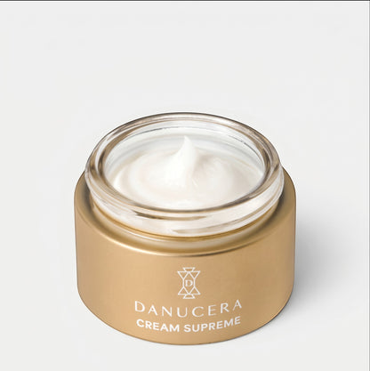 Shop Rescue Spa Danucera Cream Supreme moisturizer in a gold jar with a white cream texture visible.