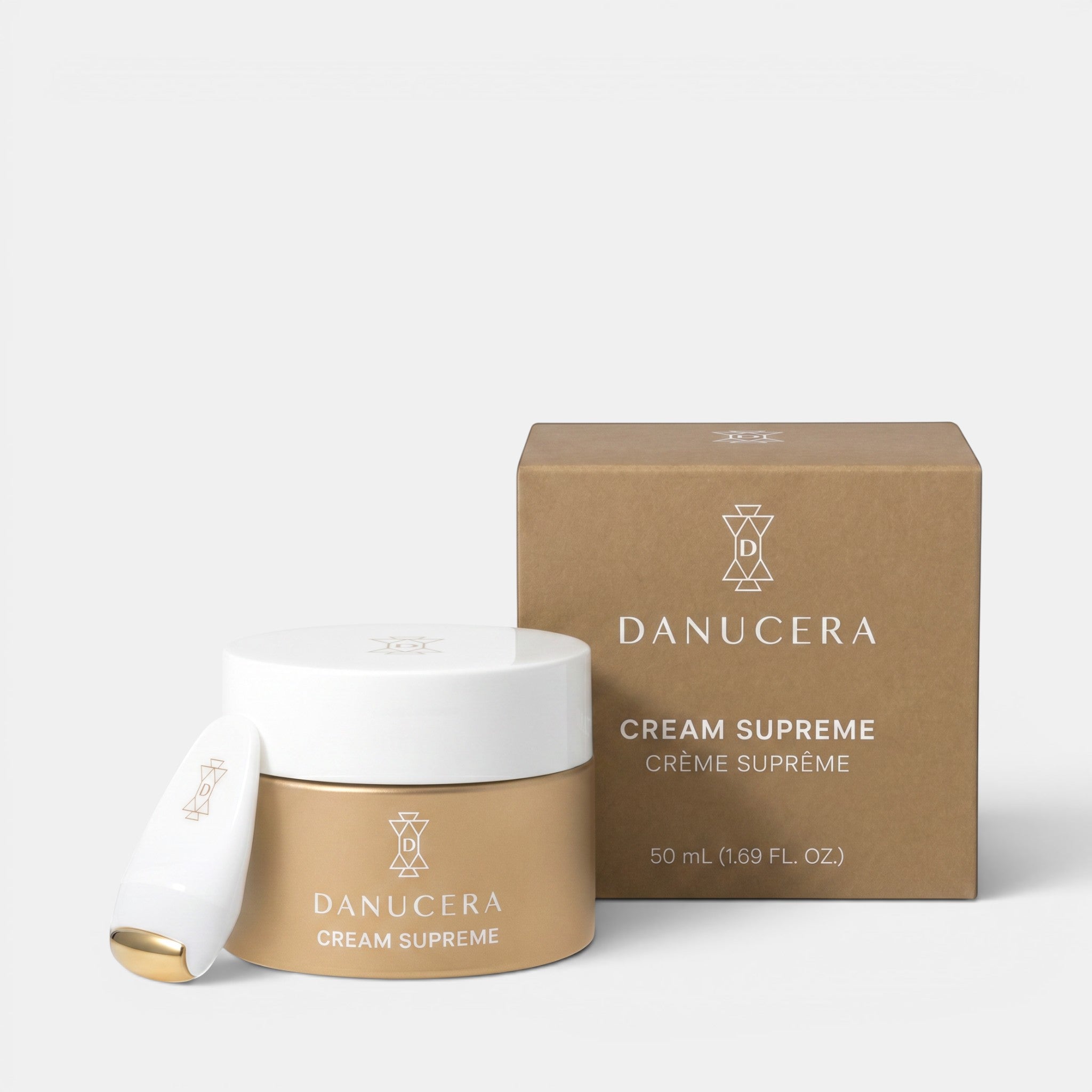 Shop Rescue Spa Danucera Cream Supreme moisturizer jar with applicator and box on a neutral background.