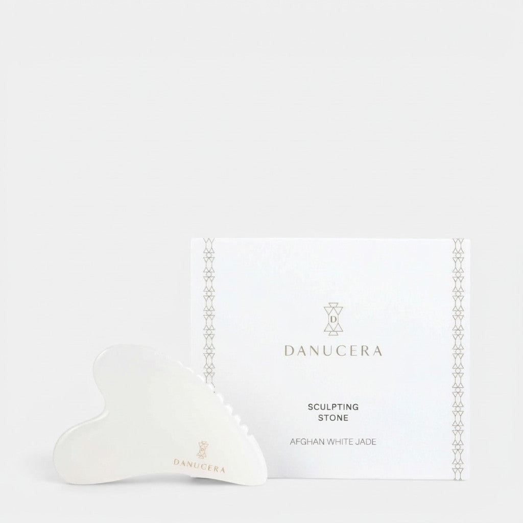 Shop Rescue Spa DANUCERA Sculpting Stone made of natural white jade for facial lifting, toning, and de-puffing.