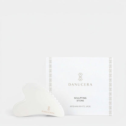 Shop Rescue Spa DANUCERA Sculpting Stone made of natural white jade for facial lifting, toning, and de-puffing.