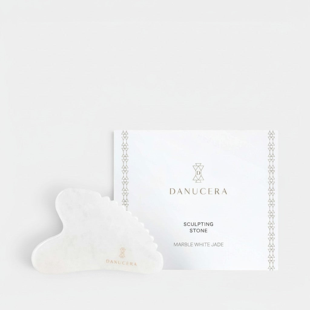 Shop Rescue Spa DANUCERA Sculpting Stone made of white jade for facial massage, lifting, and toning skin.