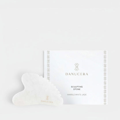 Shop Rescue Spa DANUCERA Sculpting Stone made of white jade for facial massage, lifting, and toning skin.