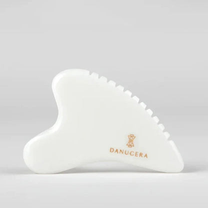 Shop Rescue Spa DANUCERA Sculpting Stone made of white jade for facial massage, lifting, and toning.