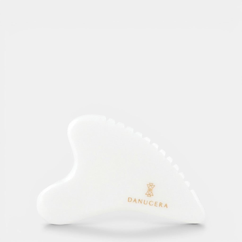Shop Rescue Spa DANUCERA Sculpting Stone made of white jade for facial massage, lifting, and toning.