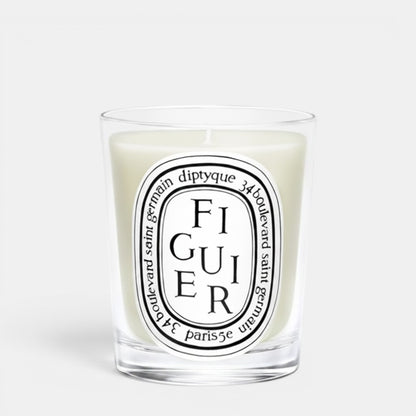 Shop Rescue Spa Diptyque Figuier scented candle in a clear glass vessel with a signature oval label
