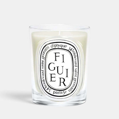 Shop Rescue Spa Diptyque Figuier scented candle in a clear glass vessel with a signature white oval label