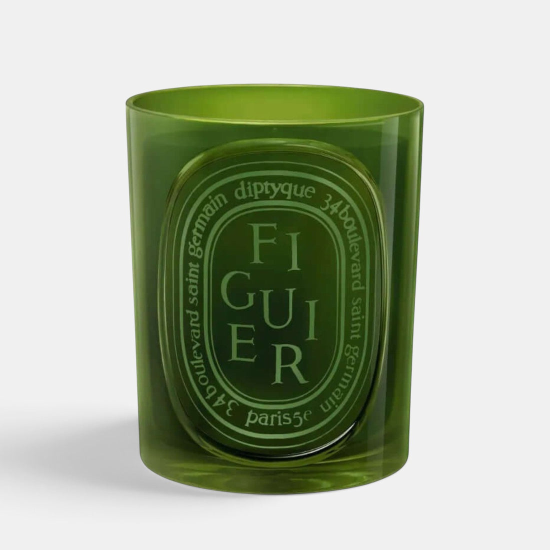 Shop Rescue Spa Diptyque Figuier scented candle in a translucent green glass vessel with signature oval label