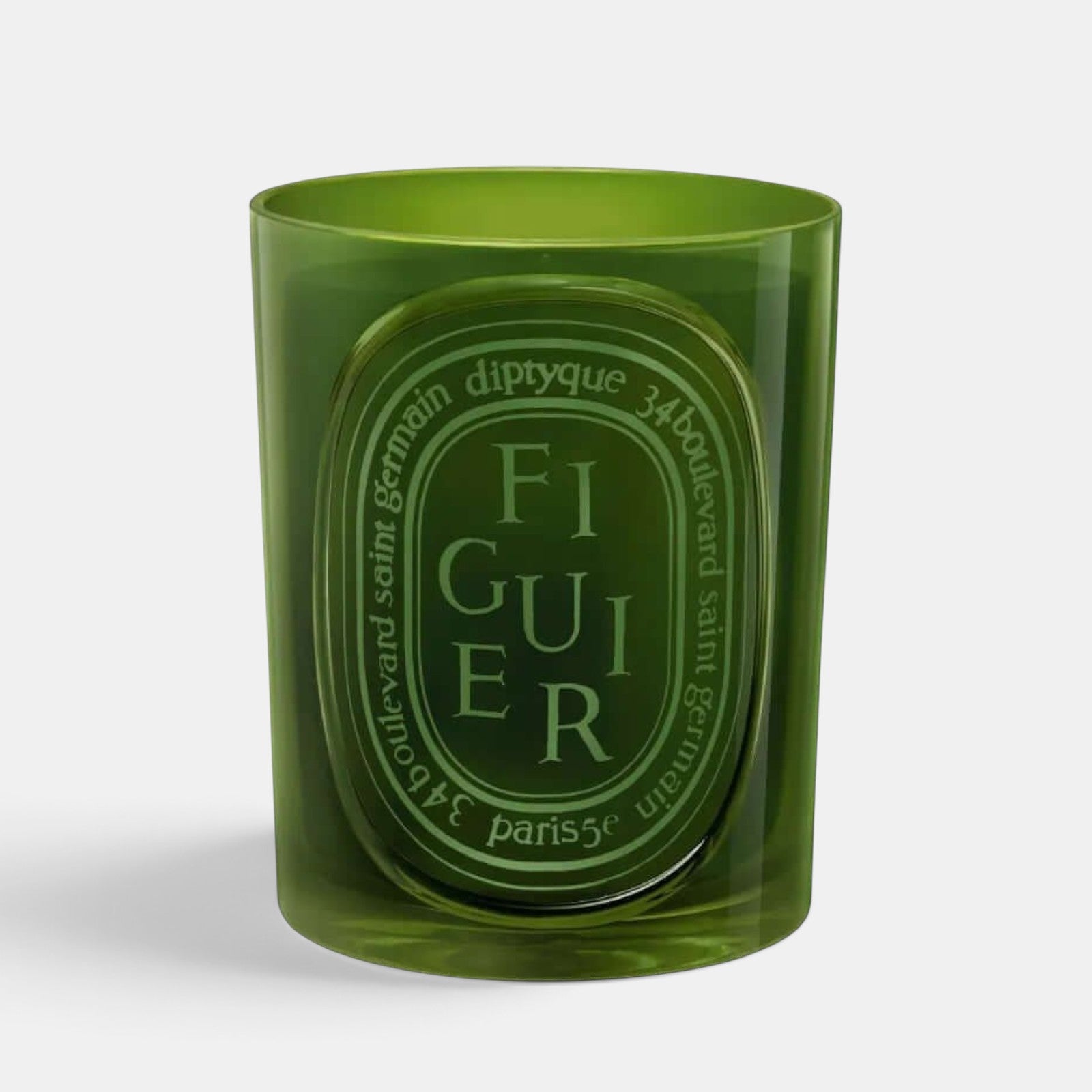 Shop Rescue Spa Diptyque Figuier scented candle in a translucent green glass vessel with signature oval label