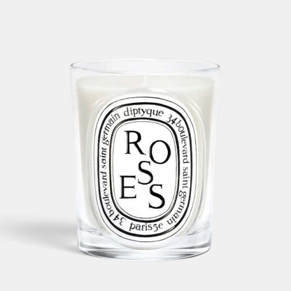 Shop Rescue Spa Diptyque Roses scented candle in a clear glass vessel with a signature oval label