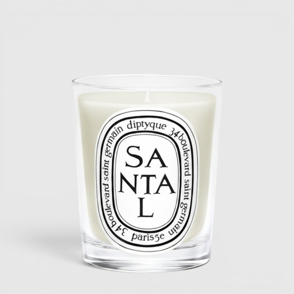 Shop Rescue Spa Diptyque Santal scented candle in a clear glass vessel with a signature oval label.