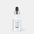 Shop Rescue Spa Discoloration Defense dark spot correcting serum in a white bottle with a dropper cap.
