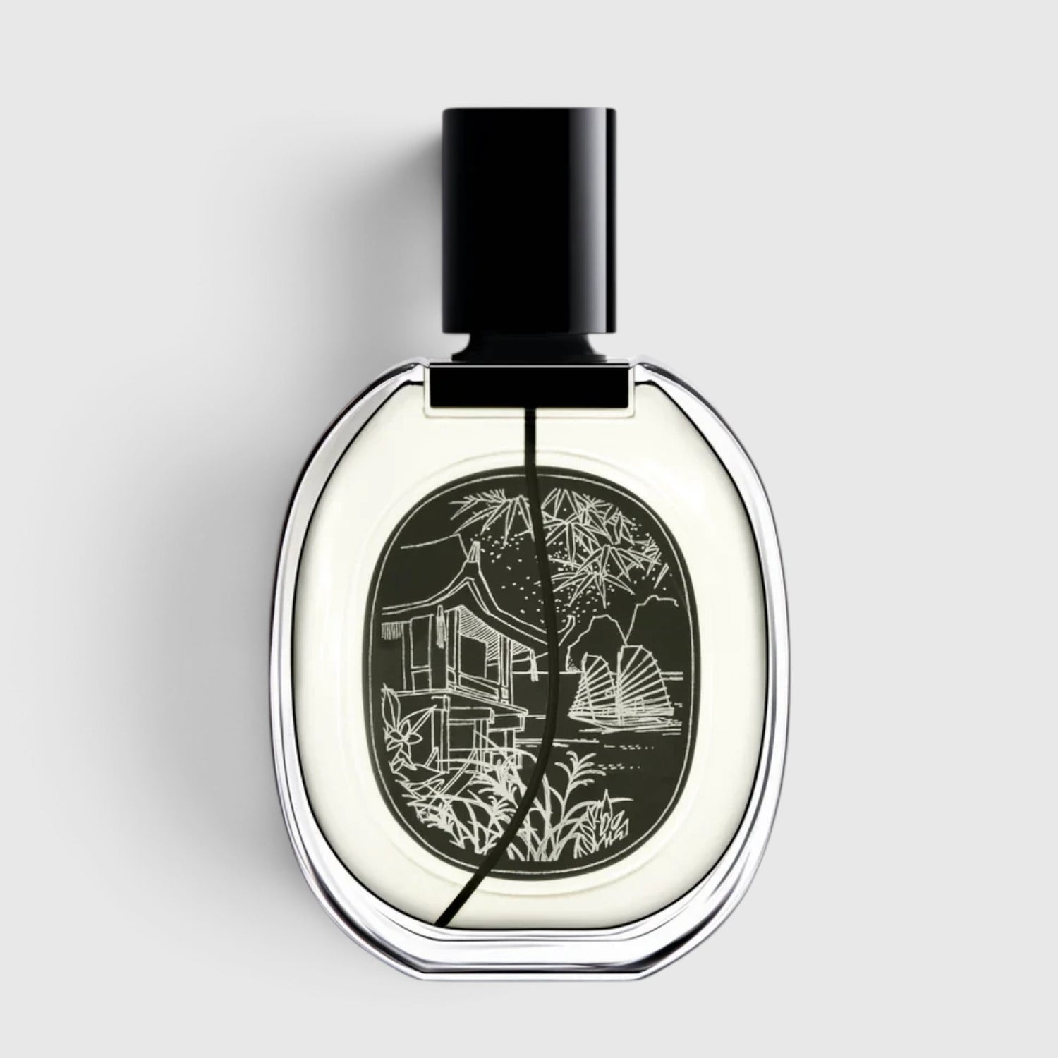 Shop Rescue Spa Do Son Eau de Parfum in a clear glass bottle with a black cap and an illustrated label of a pagoda.