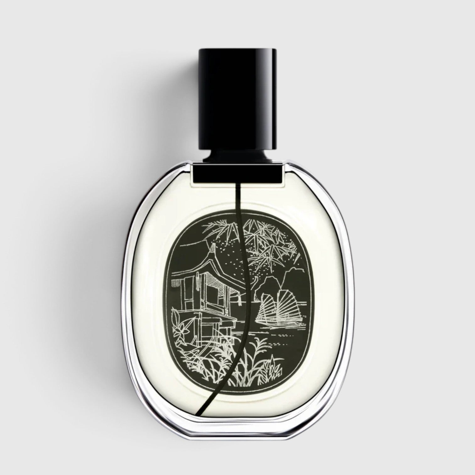 Shop Rescue Spa Do Son Eau de Parfum in a clear glass bottle with a black cap and an illustrated label of a pagoda.