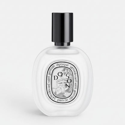 Shop Rescue Spa Do Son Hair Mist in a clear glass bottle with a black cap, featuring a white floral tuberose scent.