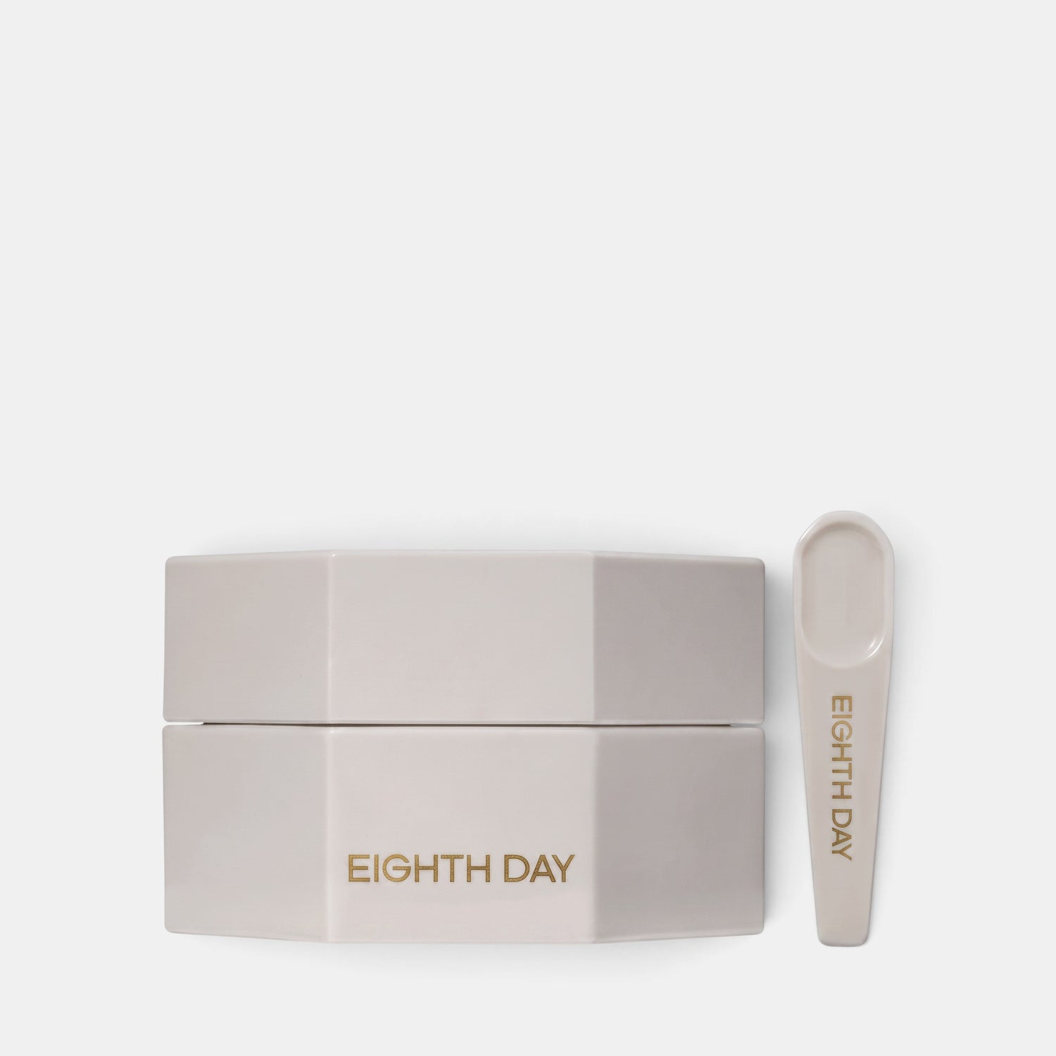 Shop Rescue Spa Eighth Day The Intensive Moisturizer in a hexagonal white jar with a matching applicator spoon