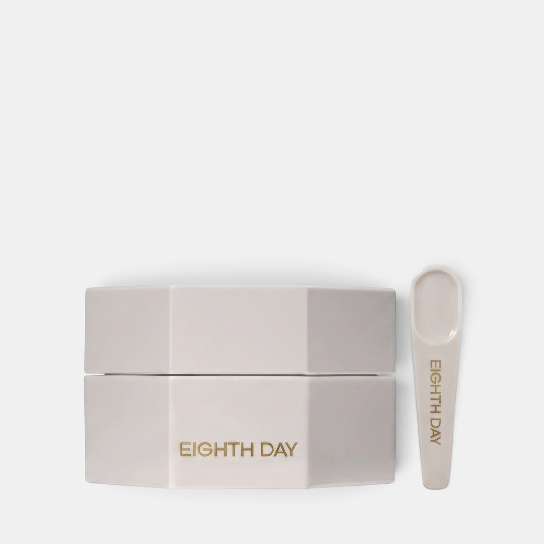 Shop Rescue Spa Eighth Day Ultra-Rich Intensive Moisturizer in a white hexagonal jar with a matching applicator spoon