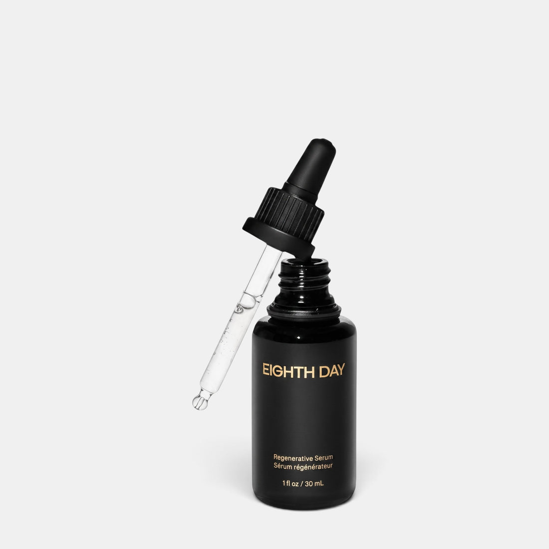 Shop Rescue Spa Eighth Day Regenerative Serum in a black glass bottle with a glass dropper against a white background.