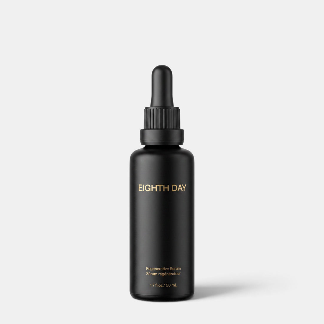 Shop Rescue Spa Eighth Day Regenerative Serum in a matte black glass bottle with a black dropper cap.