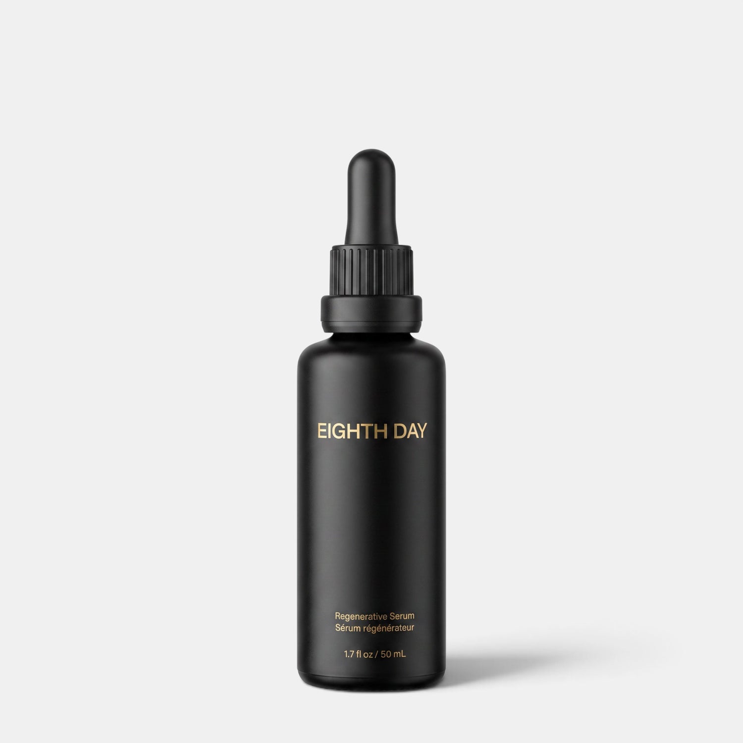 Shop Rescue Spa Eighth Day Regenerative Serum in a matte black glass bottle with a black dropper cap.