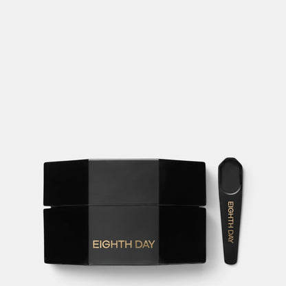 Shop Rescue Spa Eighth Day The Reparative Night Cream in a sleek black hexagonal jar with a matching applicator spoon.