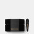 Shop Rescue Spa Eighth Day The Reparative Night Cream in a sleek black hexagonal jar with a matching applicator spoon.