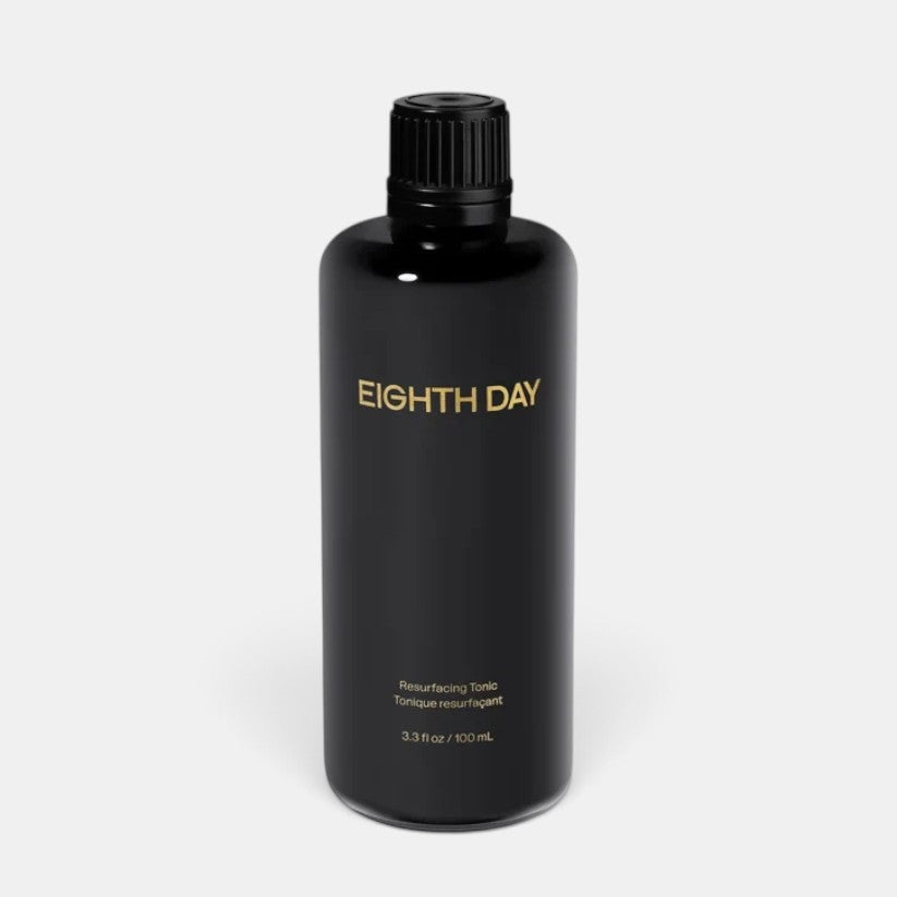 Shop Rescue Spa Eighth Day Resurfacing Tonic in a sleek black 100ml bottle for chemical exfoliation.