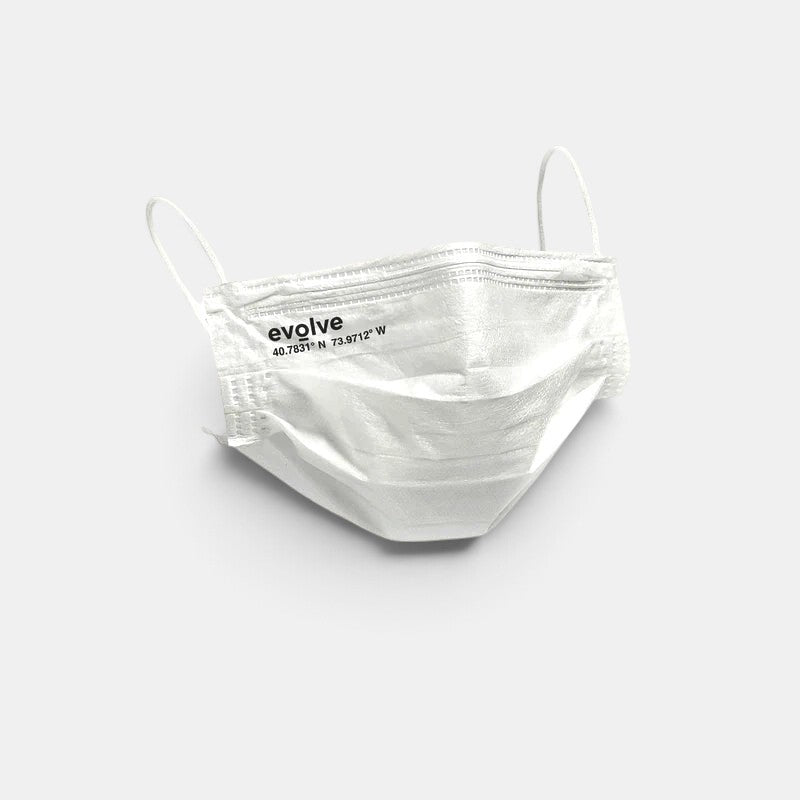 Shop Rescue Spa white Evolve 3-layer face mask with elastic ear loops and printed coordinates on a light background