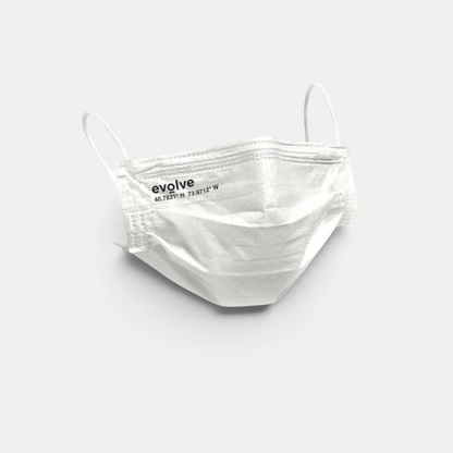 Shop Rescue Spa white Evolve 3-layer face mask with elastic ear loops and printed coordinates on a light background