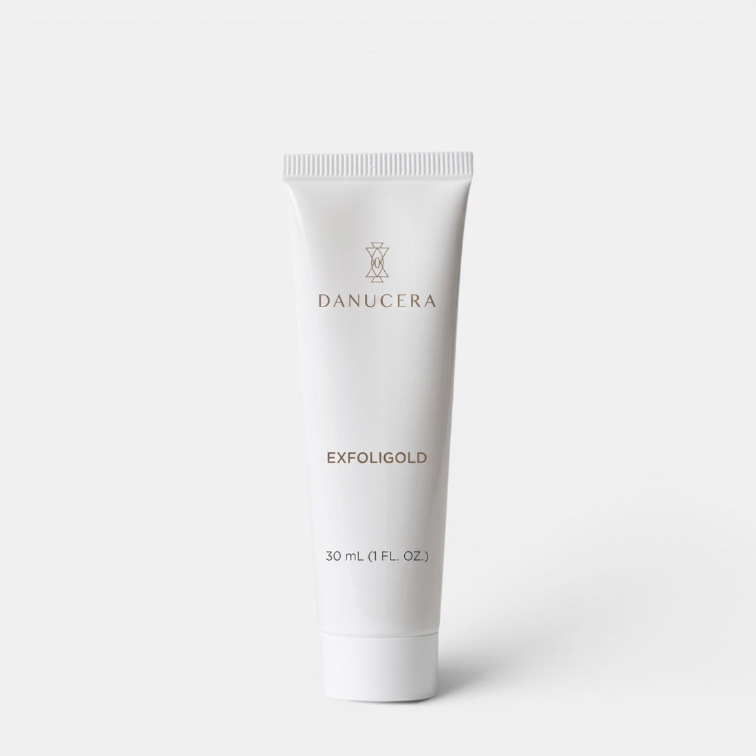 Shop Rescue Spa Exfoligold non-abrasive facial scrub in a 30ml white squeeze tube against a plain background.