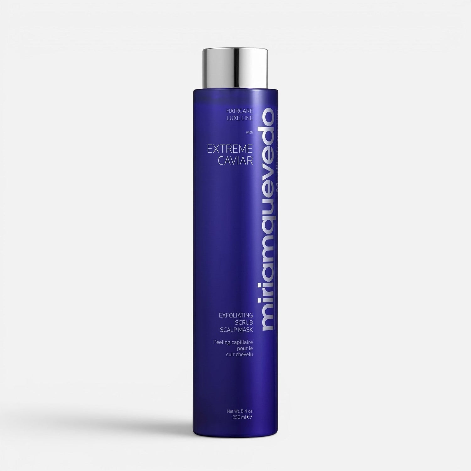 Shop Rescue Spa Extreme Caviar Exfoliating Scrub Scalp Mask in a tall, deep purple bottle with a silver cap.