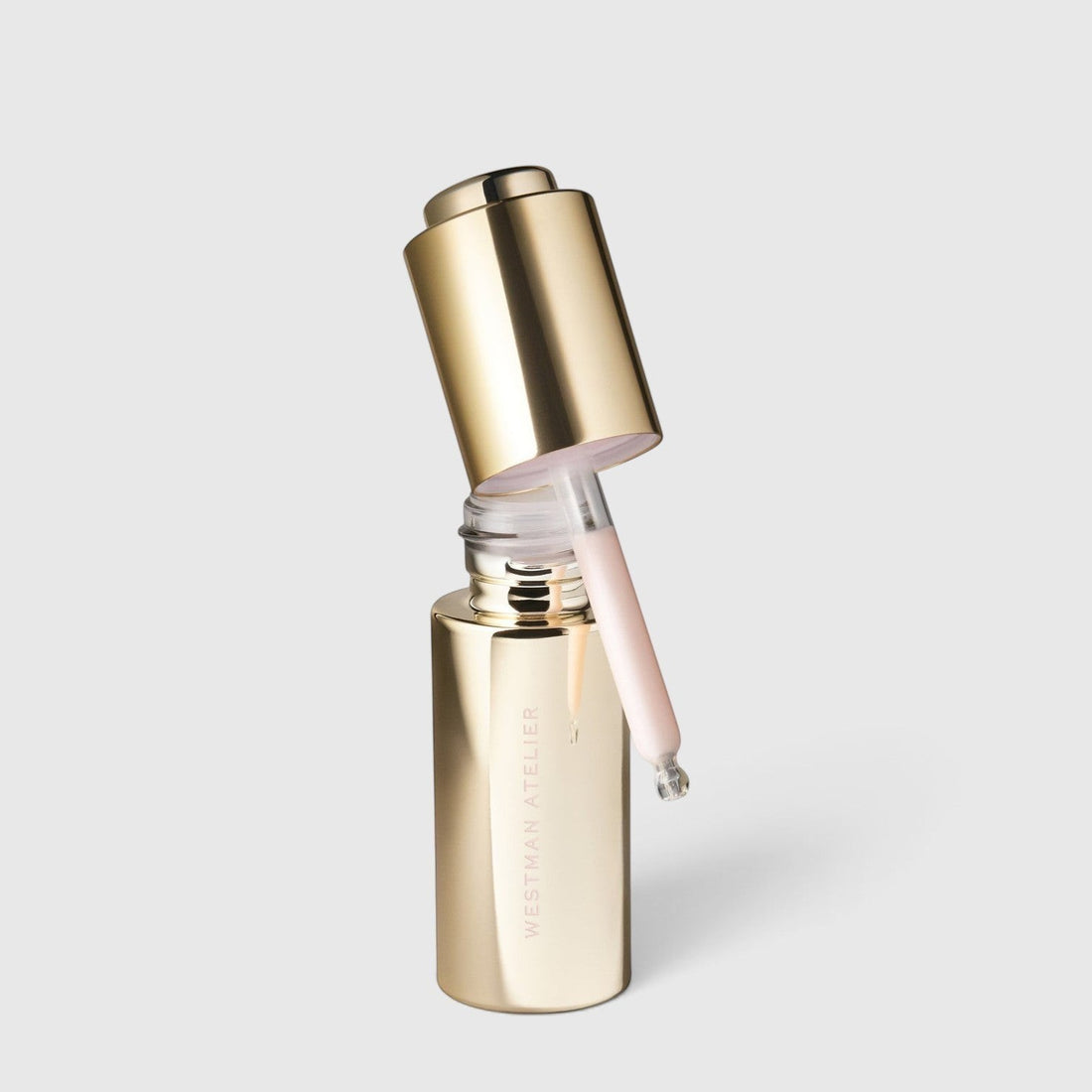Shop Rescue Spa Eye Activator Serum in a gold bottle with a dropper applicator, featuring a light pink formula.