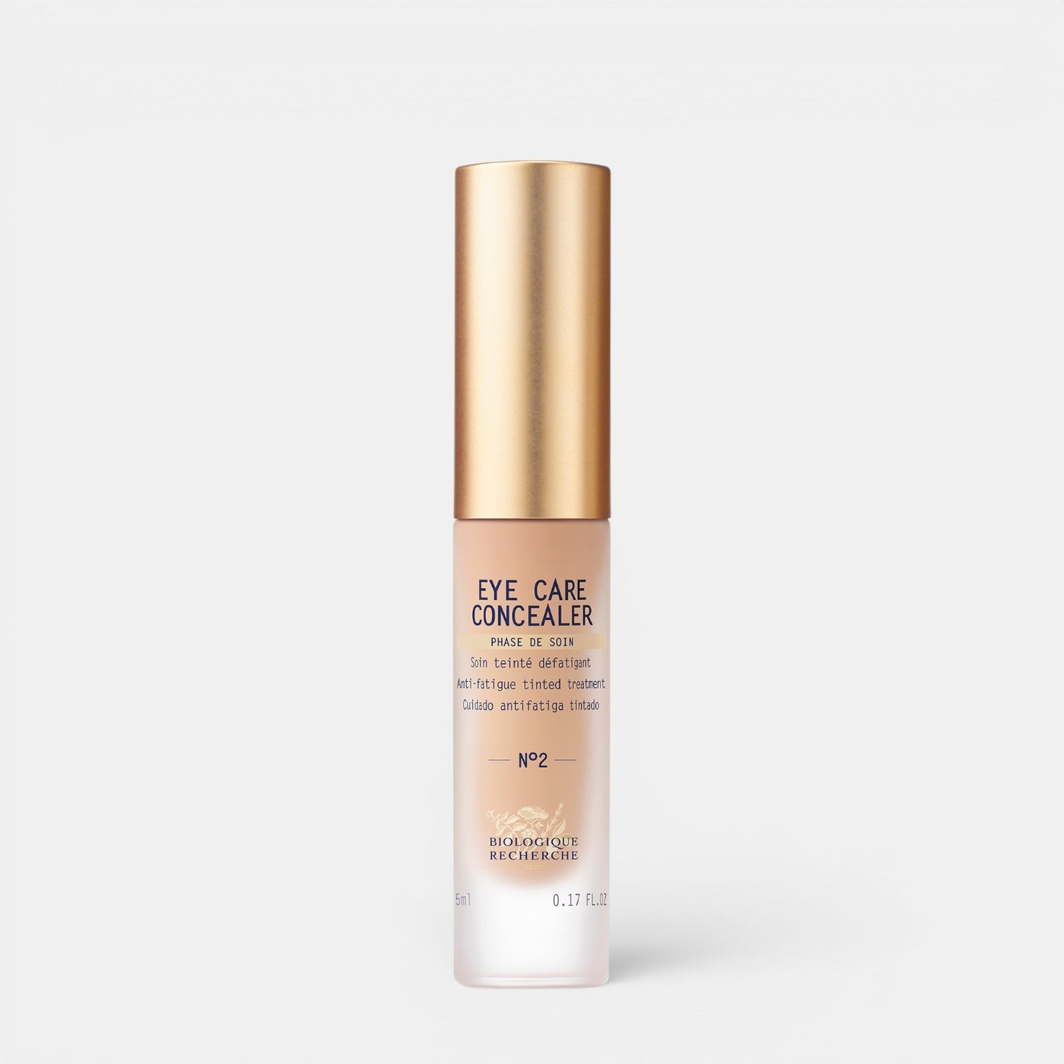 Shop Rescue Spa Eye Care Concealer No 2 in a sleek tube with a gold cap for brightening and smoothing tired eyes