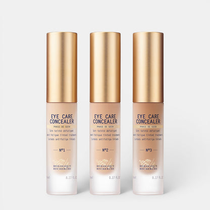 Shop Rescue Spa Eye Care Concealer in three shades with gold caps for brightening and smoothing tired eyes.